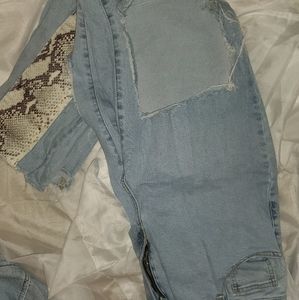 Snake print denim with knee cut outs size 14